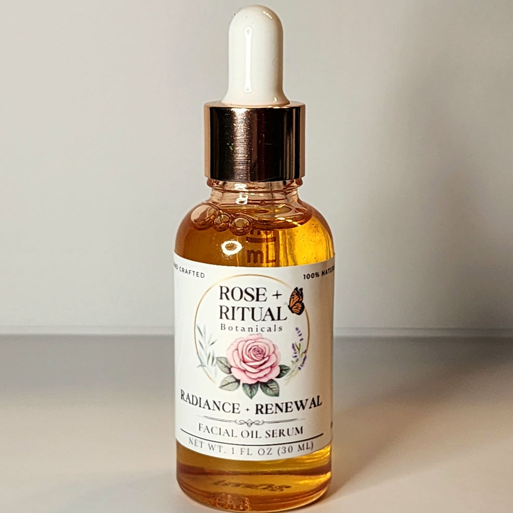 Bottle of Rose + Rituals Botanicals facial oil serum on a neutral background